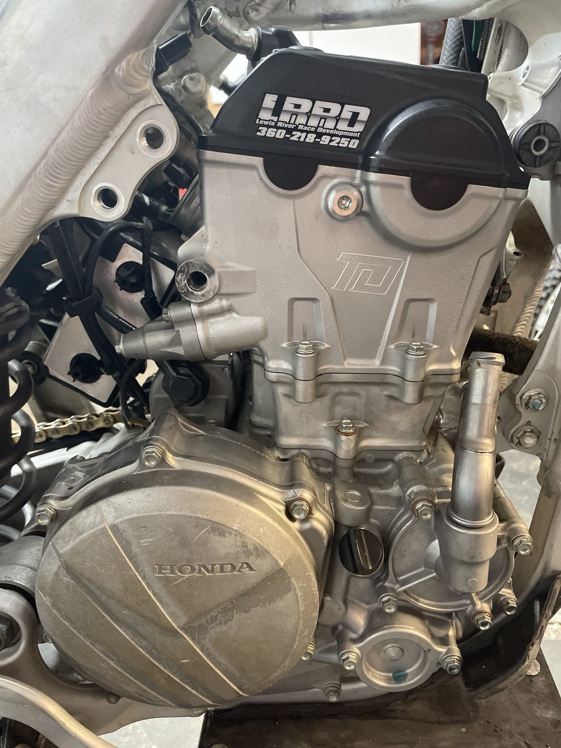 Honda motorcycle engine with LRRD branding